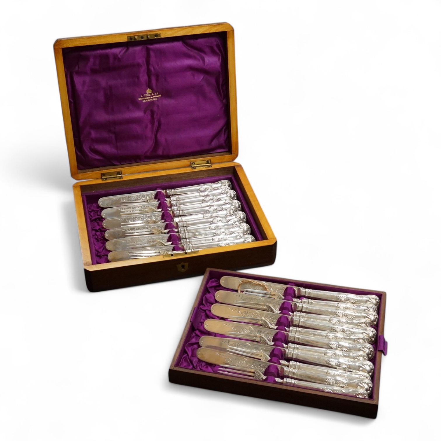 Twelve pairs of Victorian silver King's pattern dessert eaters, by John Gilbert, Birmingham, 1879/1880, loaded handles, in a mahogany canteen.